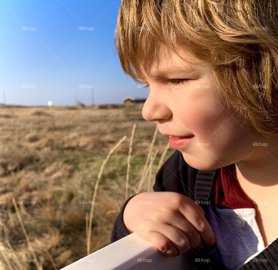 Thoughtful child outside