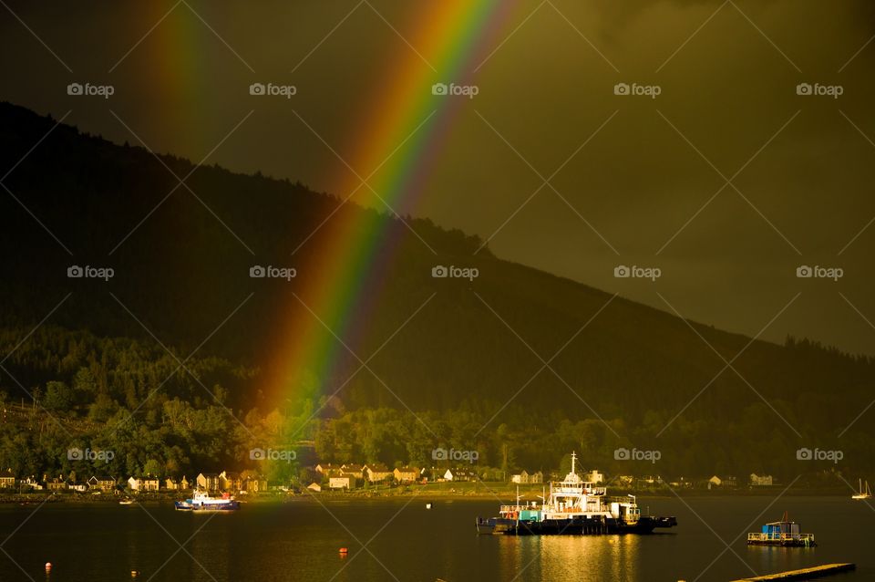 Scenic view of rainbow over sea