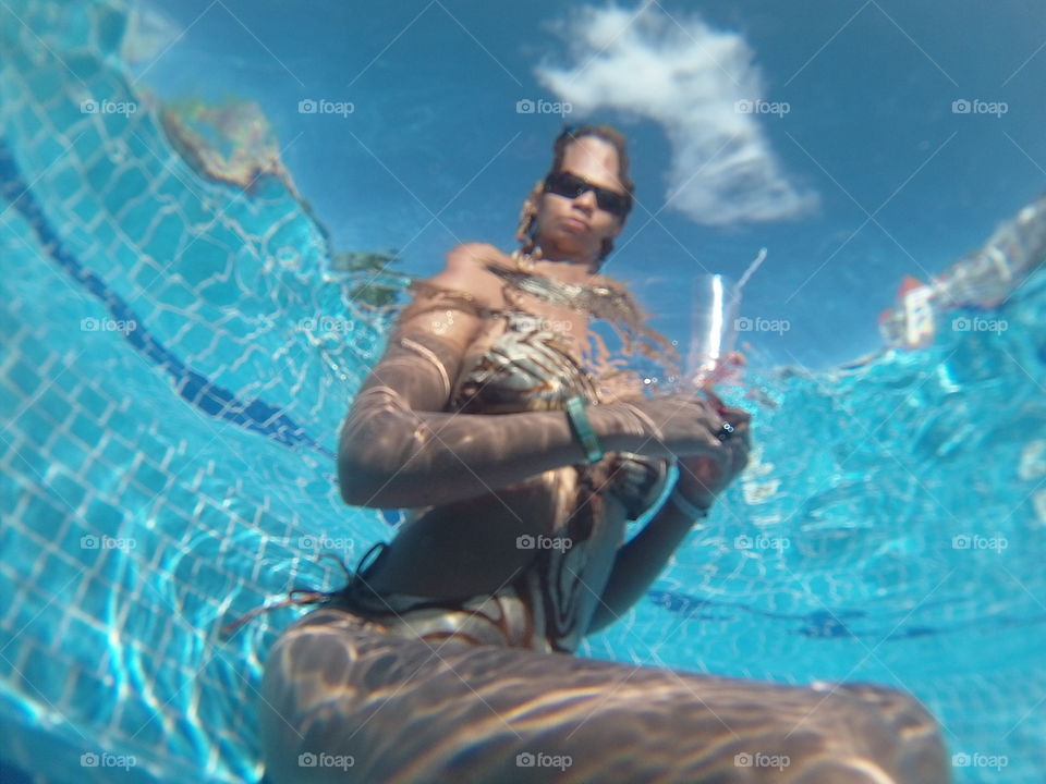 underwater photo of a bikini clad woman