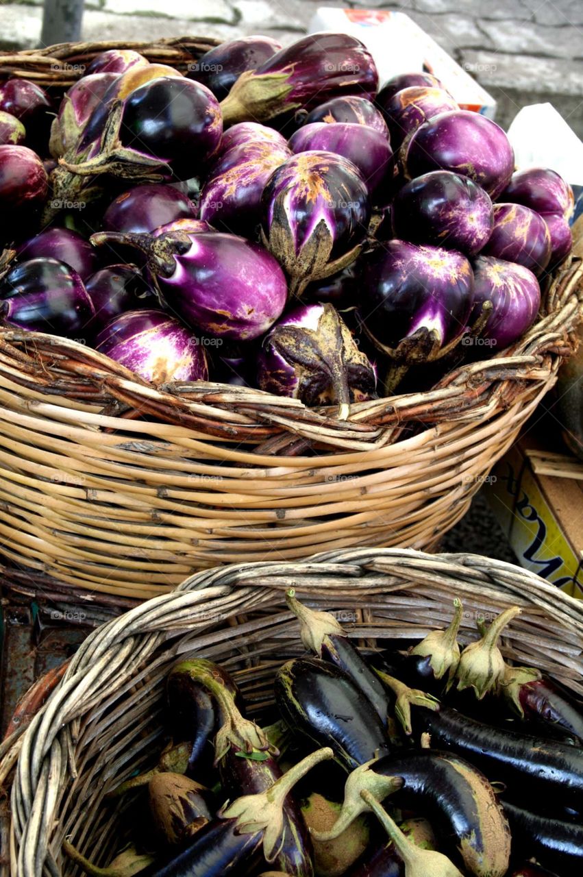 Purple vegetable baskets. Taken at the food markets in Calabria, Southern Italy. Delicious Fresh Produce! 