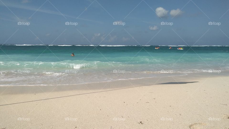 Beautiful beach at Pandawa Bali. Blue sky, green and young green water and white sands. So amazing. I love Indonesia.