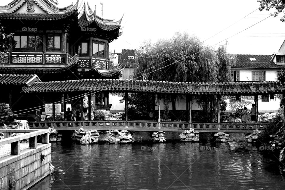 A traditional chinese bridge in old pudong in Shanghai China. it is a very old place in Shanghai worth visiting. there are a lot of old traditional buildings.