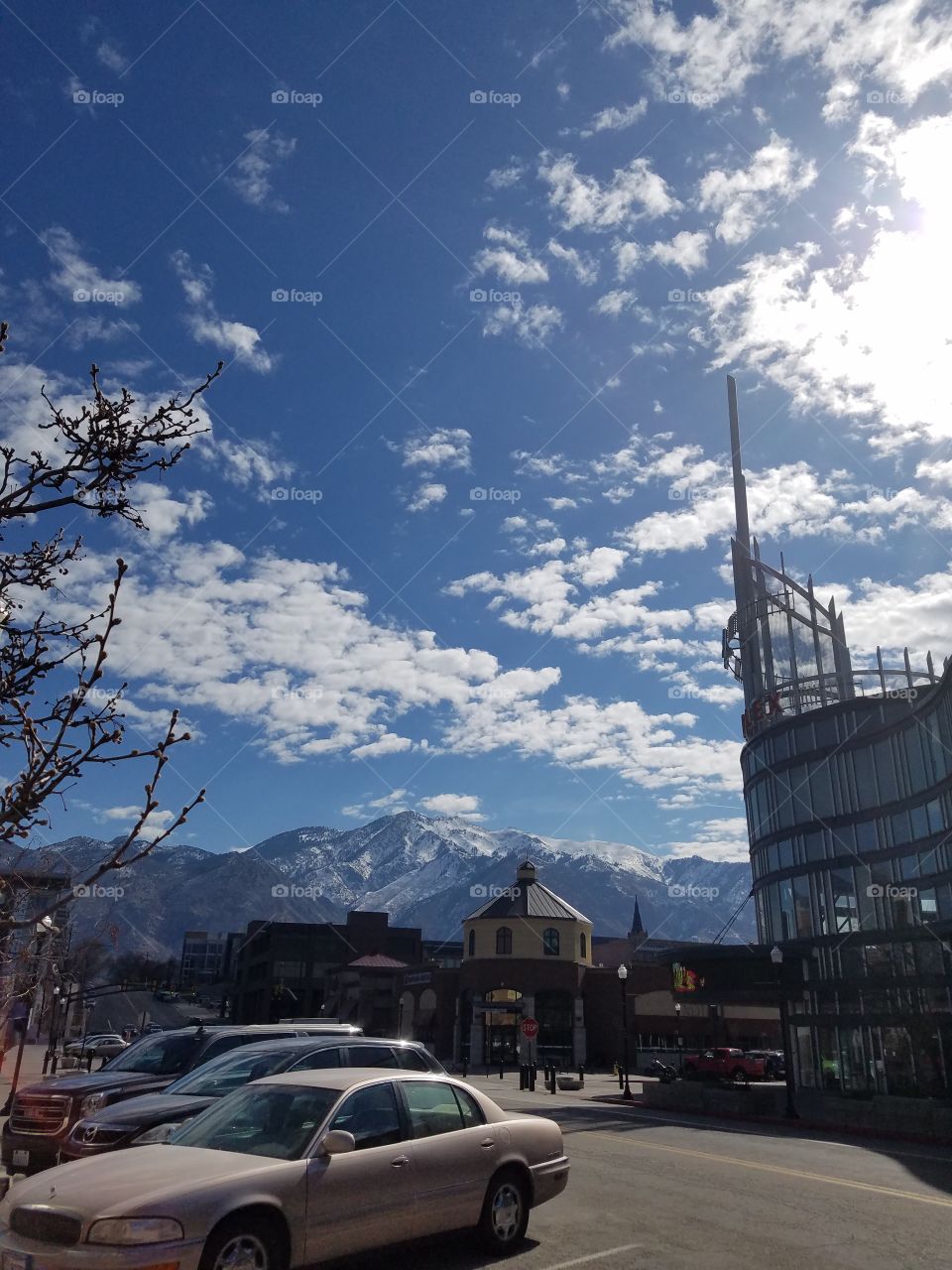 downtown Ogden, pretty urban life mixing in with scenic mountains in the background.