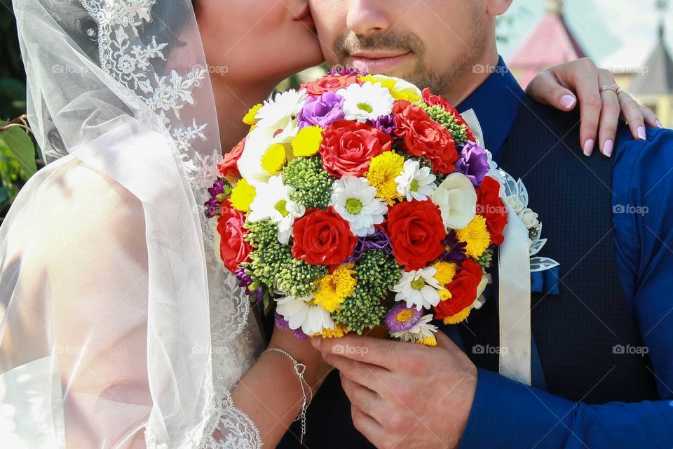 Wedding kiss of a happy couple