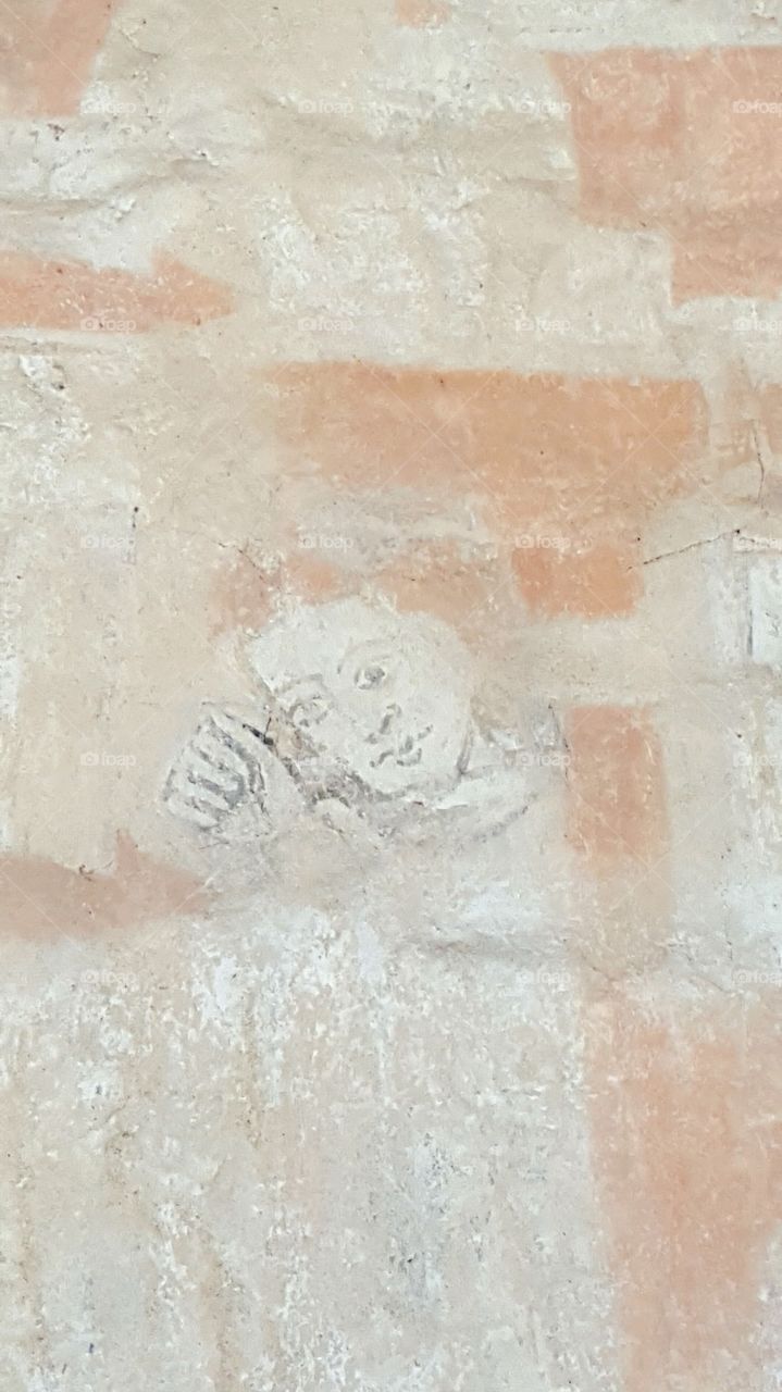 Wall art. Picture taken in Dädesjö Old Church in Sweden, an early Medieval church world famous for its roof paintings and wall art