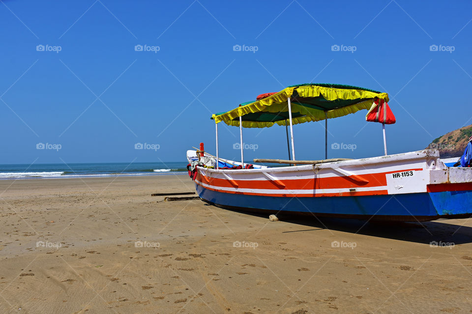 Colourful fishing boat in a beach