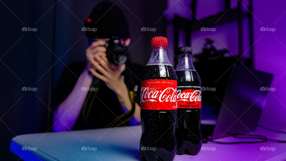 The photographer as if seeing him shooting picture of Coca-cola, as from another photographer’s point of view!