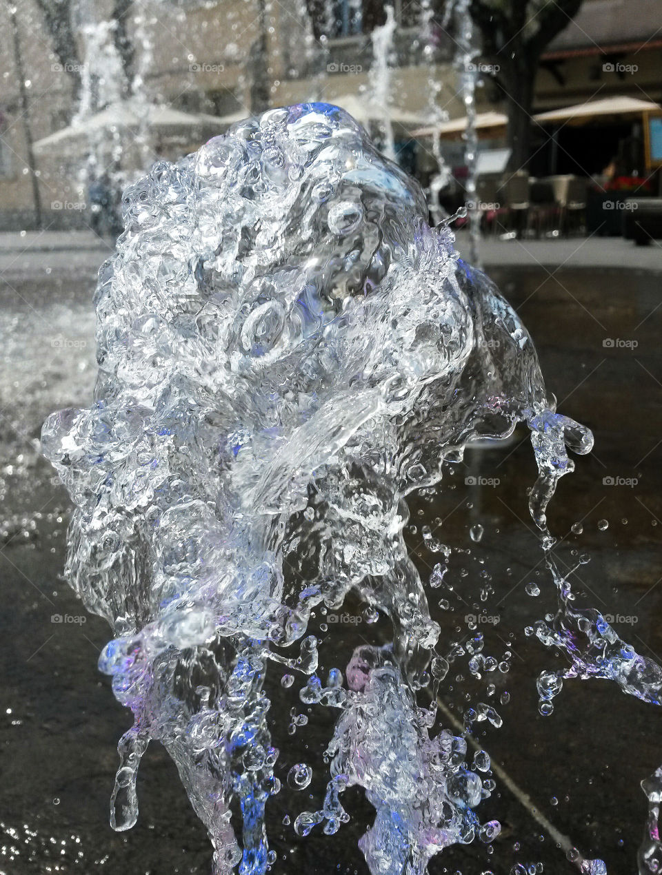 water in motion, close up of splash fountain