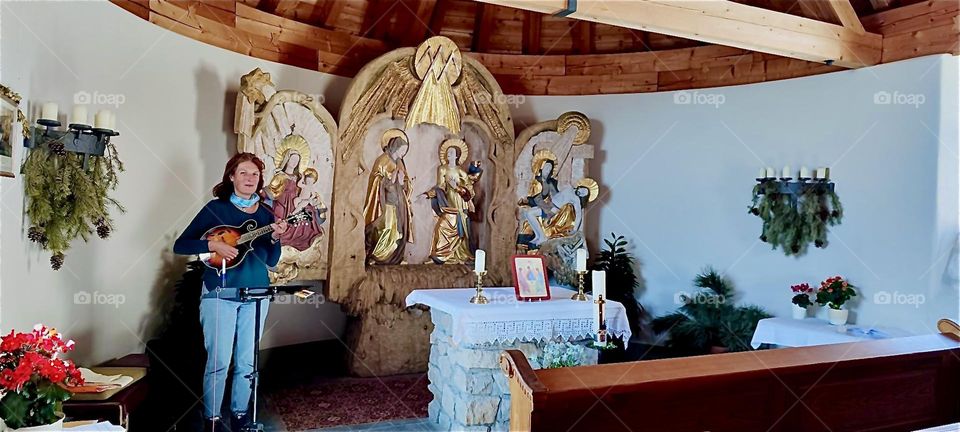 Our lady gives a musical ovation at the “Zugspitze” Chapel “Mariä Heimsuchung” “Visitation of Mary” inaugurated 1980 by “Cardinal Ratzinger” (later “Pope Benedict XVI”) and at 2,950 m the highest situated church in Germany. 2024. Hypnotic Productions