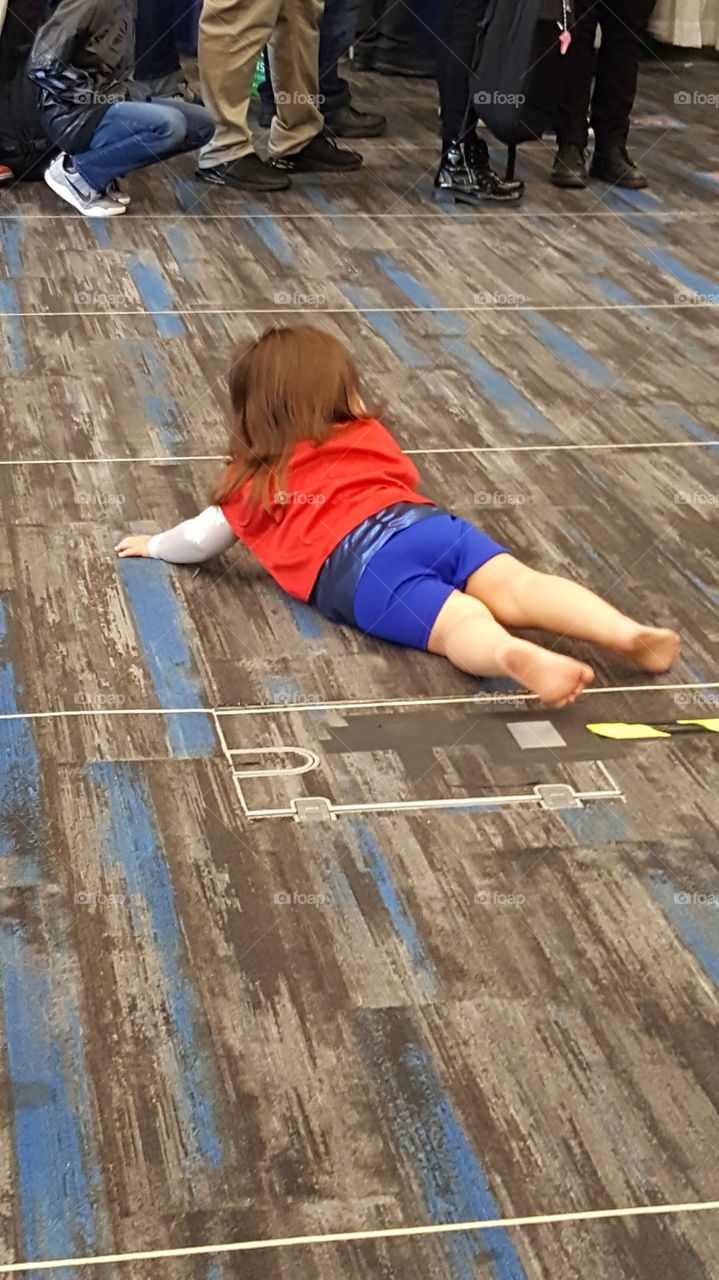 Kid dressed up as Baby Thor at Comic Con.