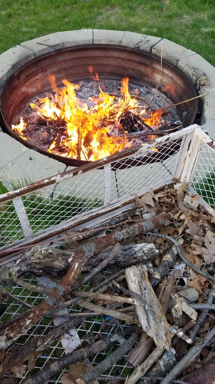 burning sticks after cleaning the yard