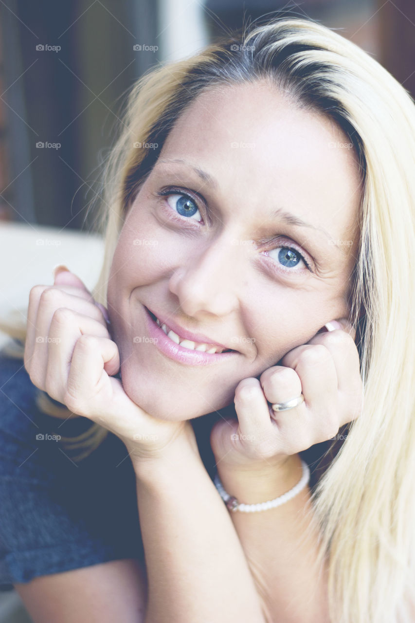 portrait of a blond girl. portrait of a beautiful blond girl with blue eyes