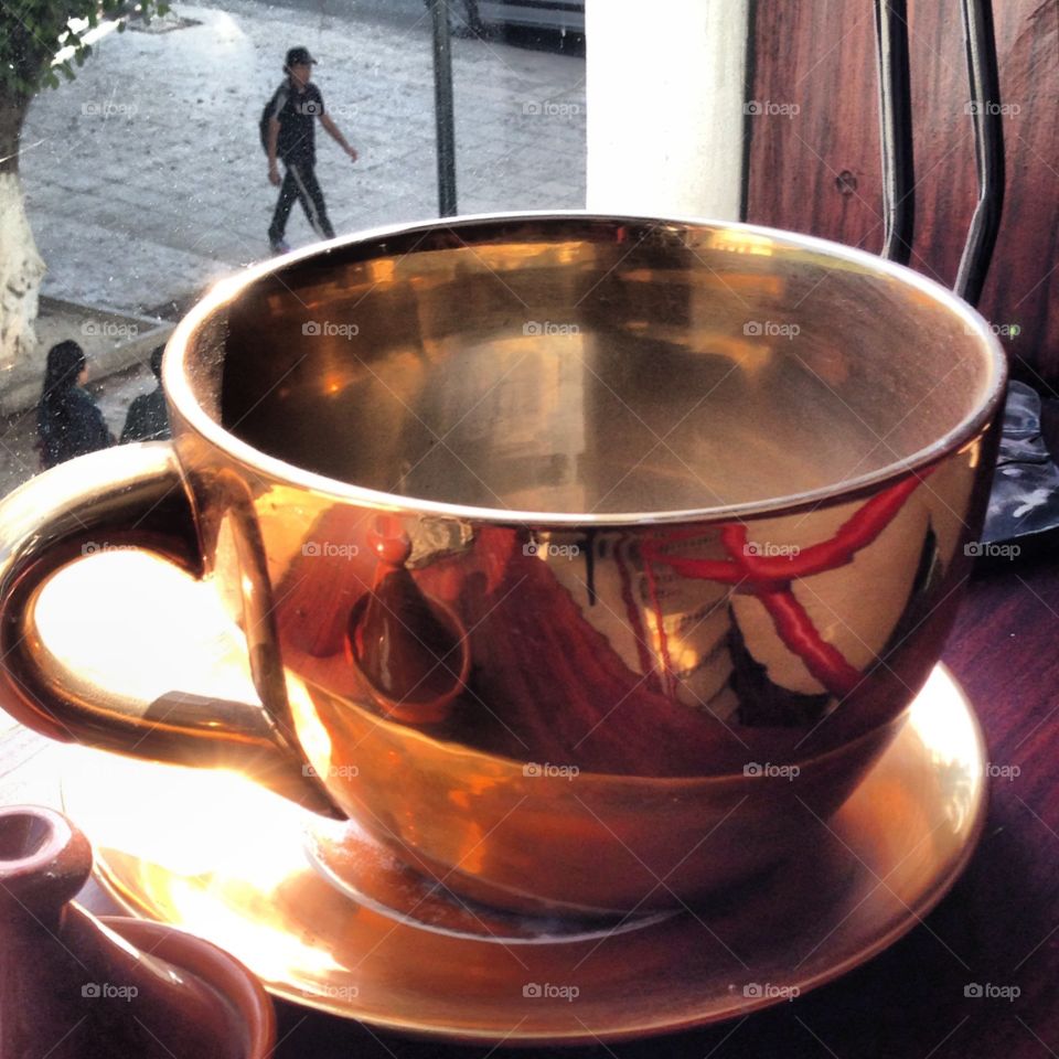 Golden Cup of coffee, extra large coffee cup ,photo taken in Rabat Morocco 