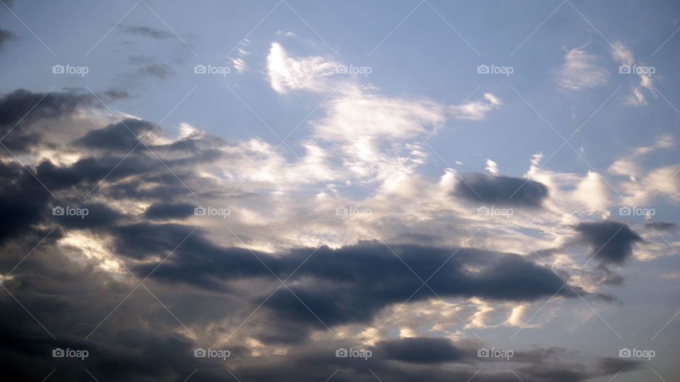 Bouncing bunny ears among the moving clouds.