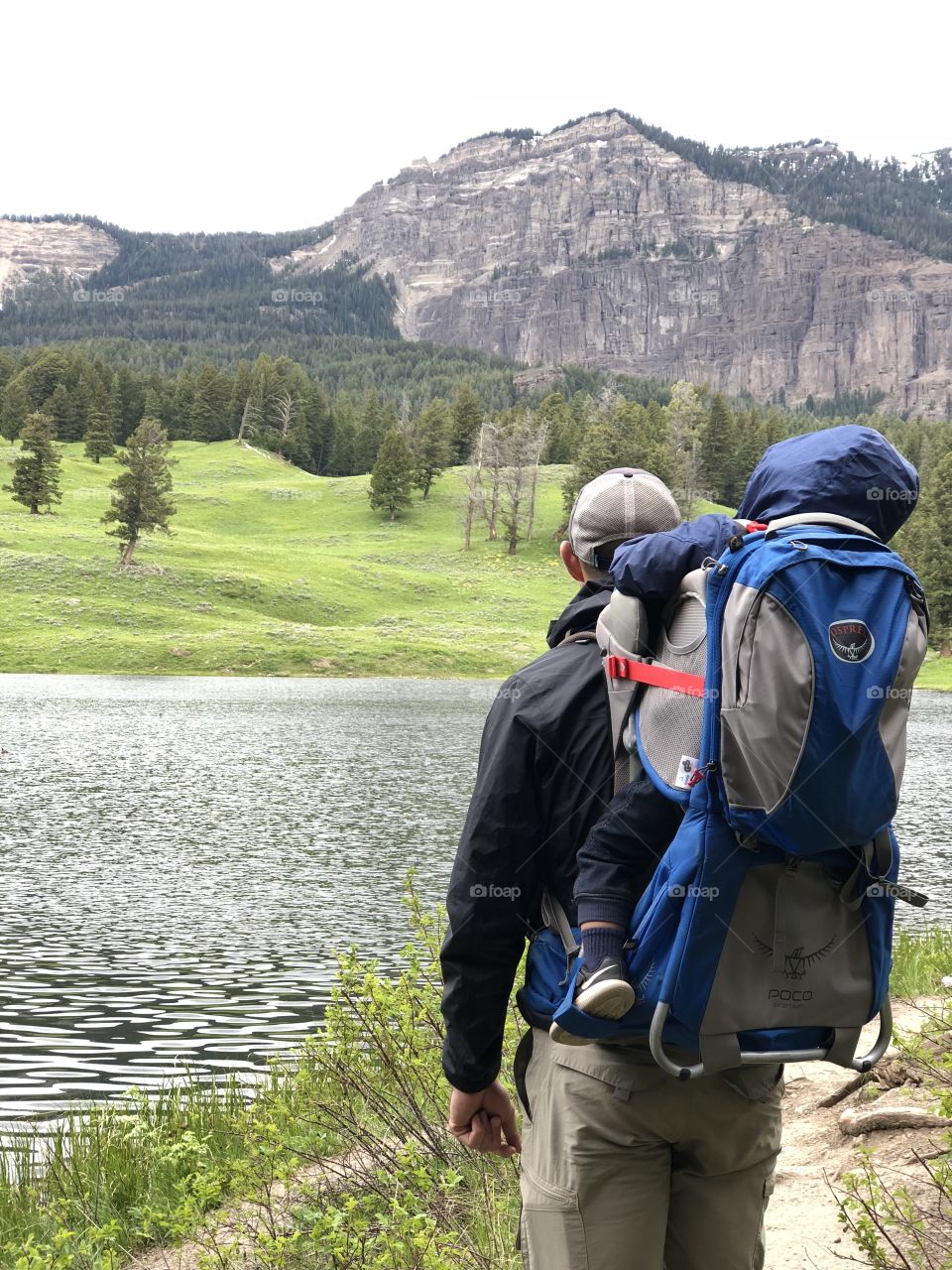 Dad and son backpacking in Yellowstone osprey backpack