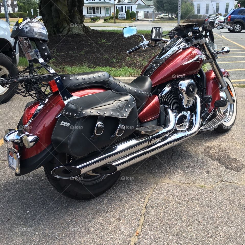 Vulcan motorcycle in red.