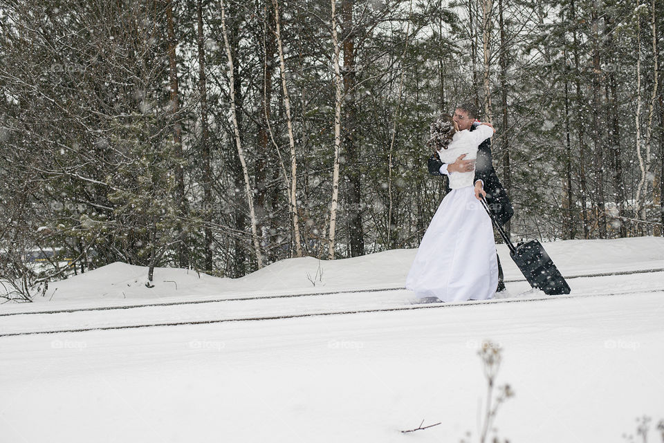 Young couple kissing in winter