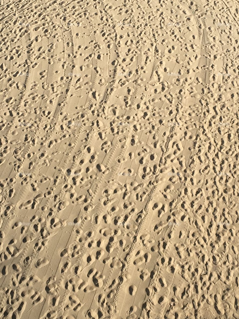 High angle view of footprint on beach