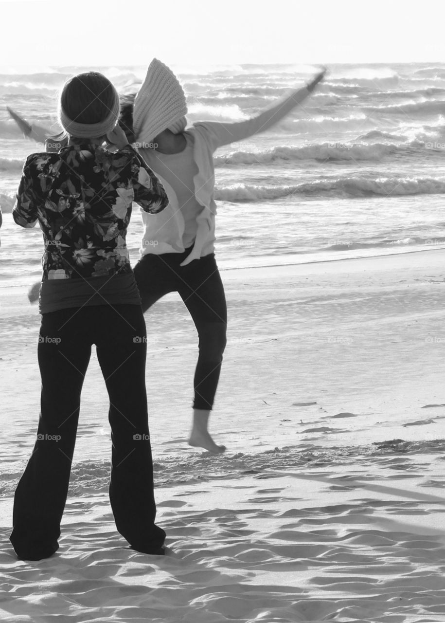 Jumping for joy on the sandy beach by the Gulf of Mexico!
A family from New England enjoying the warm breeze and sandy beach!