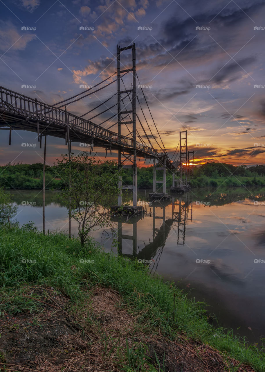 scenic view of old bridge during sunset