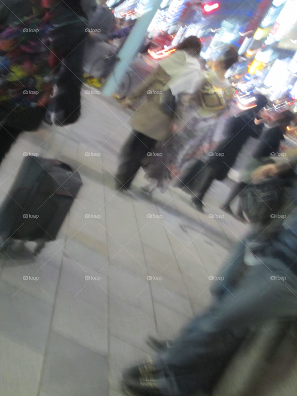 Train Station, Tokyo, Japan. Blur. People Walking, Traveling with Luggage.