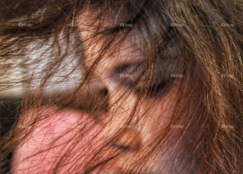 wind in hear of little girl