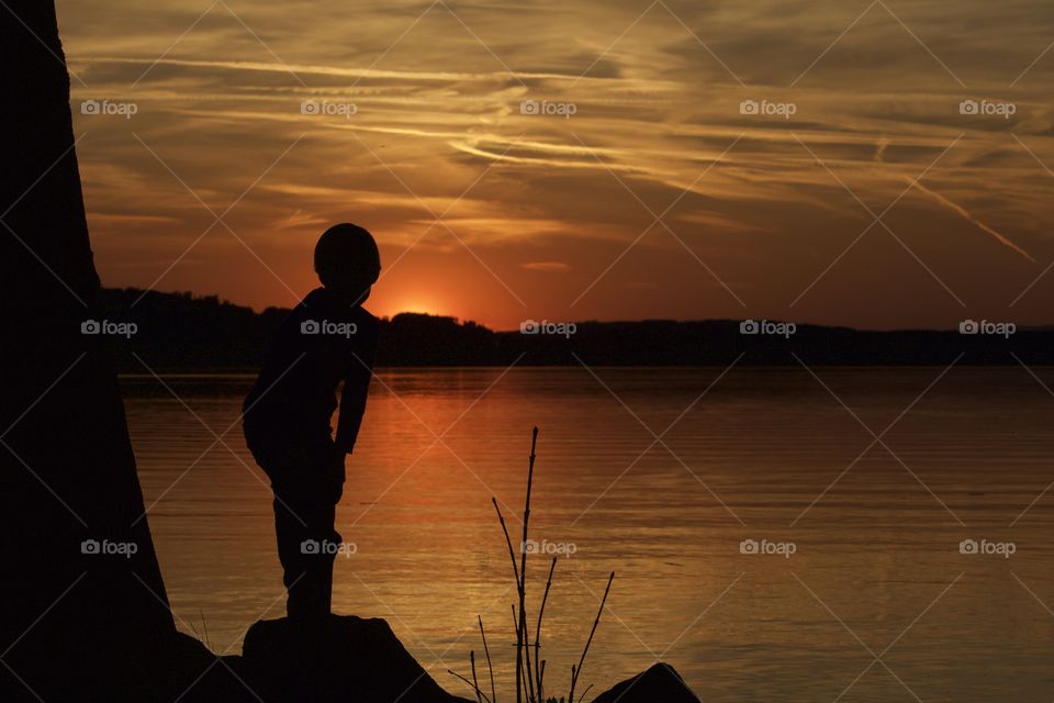 Silhouette of boy during sunset