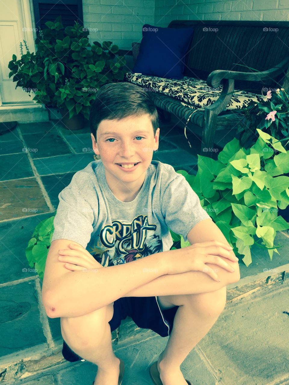 Summer patio plants boy smiling