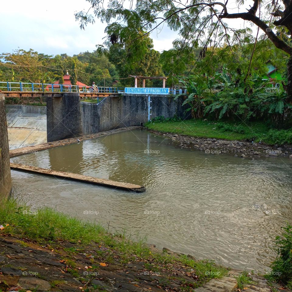 River dam connecting between villages
