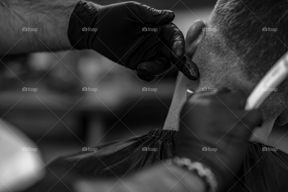 Barber cutting hair