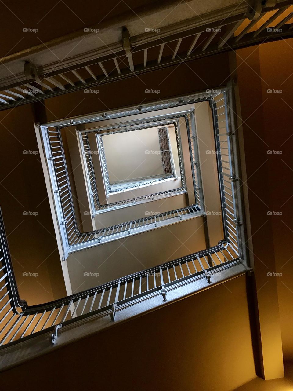 POV looking up from bottom of stairwell