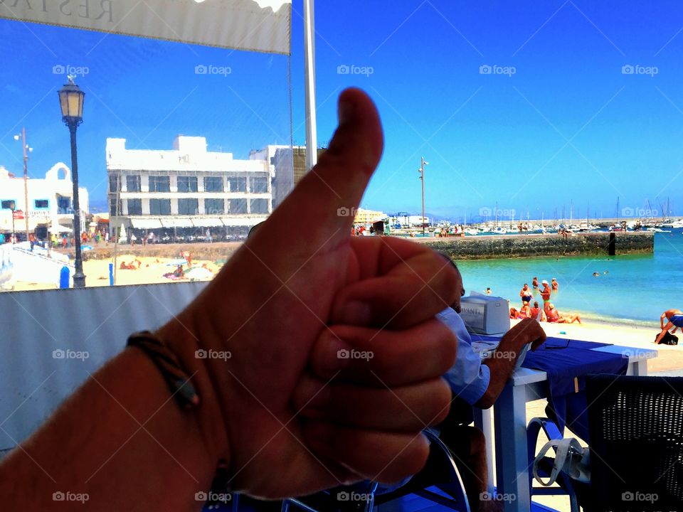 Thumb finger, sea ,enjoyment , hand , fun