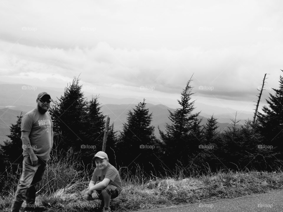 Beautiful sky view to reflect bonding of father & son at Clingmans Dome, Smoky Mountains National park.