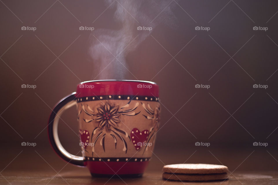 Hot coffee with cookies