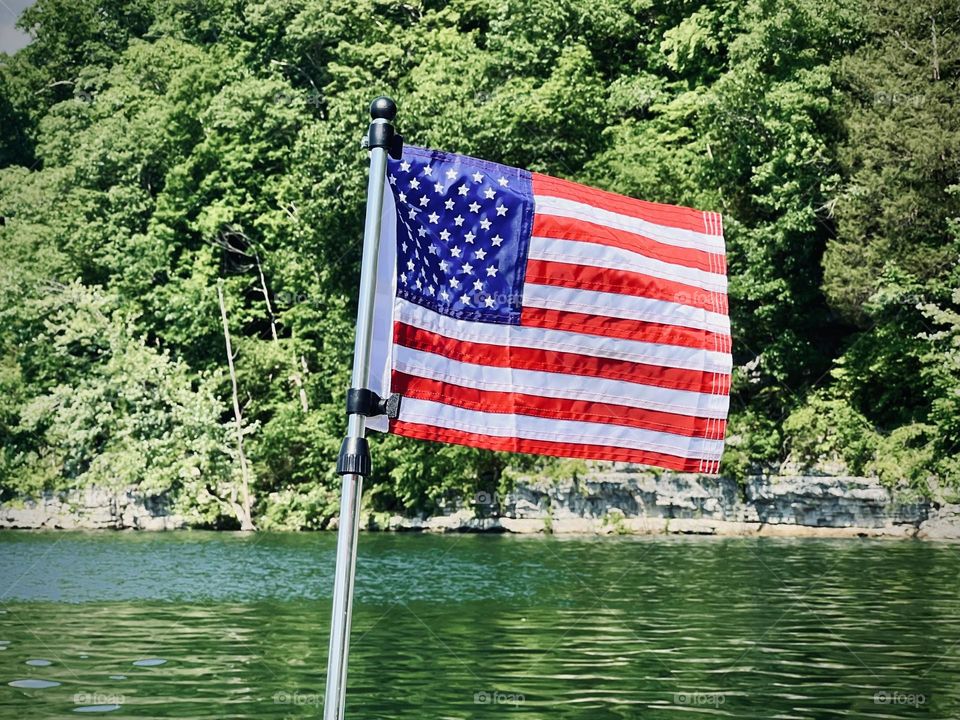 Flag flying from a boat on American Independence Day 