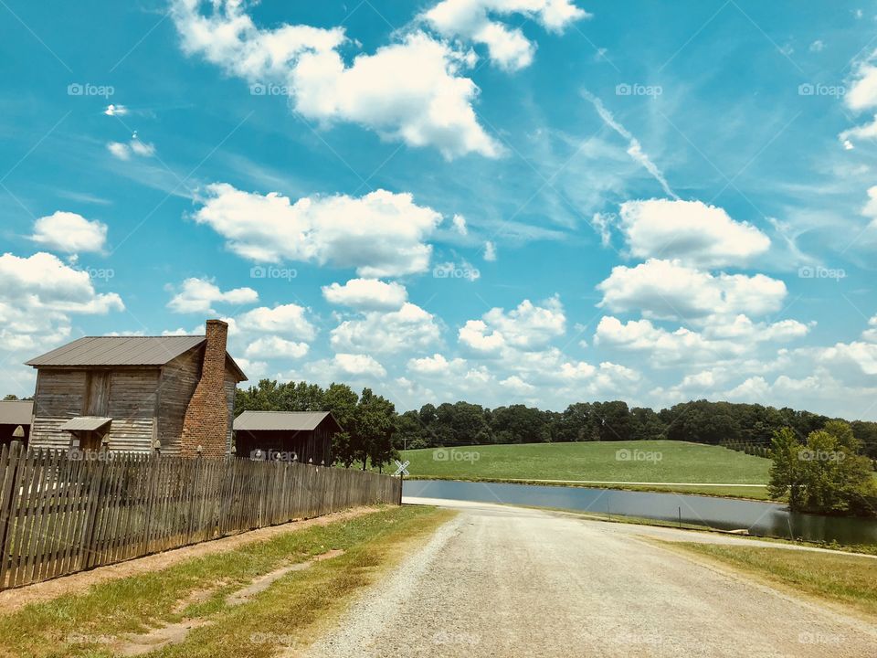 Country farm park showcasing antiques and yesteryear under Carolina skies. 