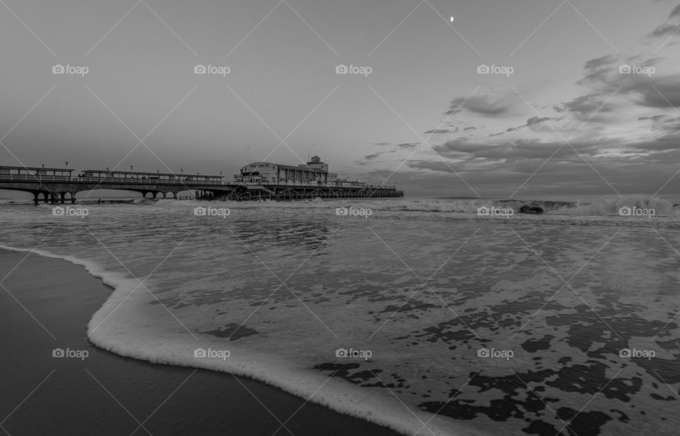 Black and white beach and pier