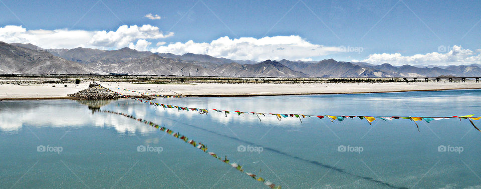 tibetan lake and flags