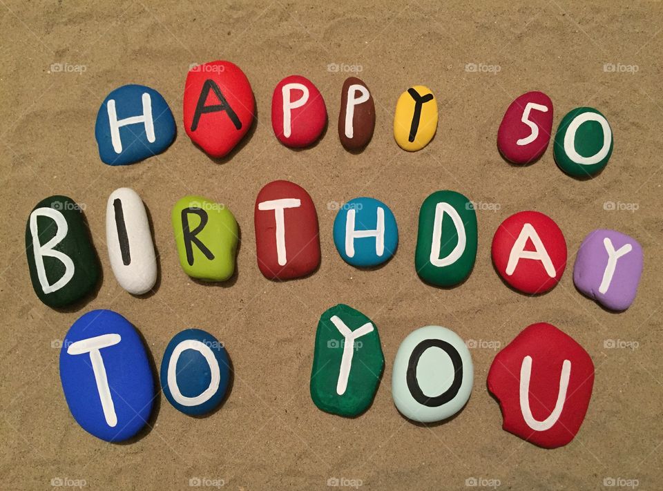 Happy Birthday to you, 50 years composition on colored stones