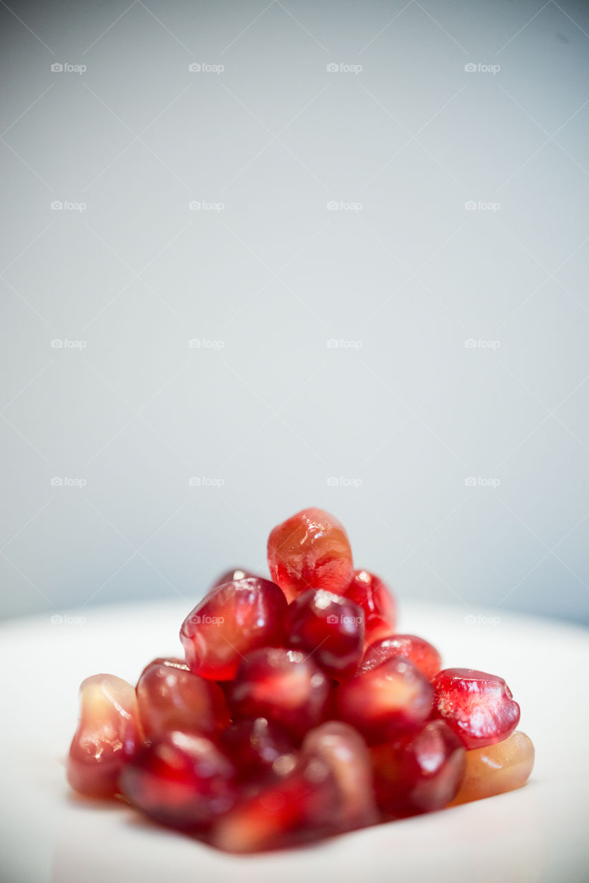 a pyramid of pomegranate pearls