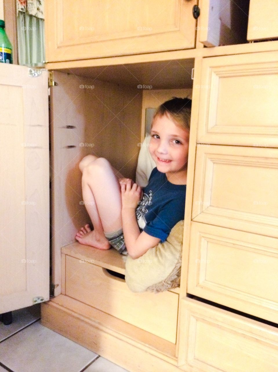Hiding in cabinet  