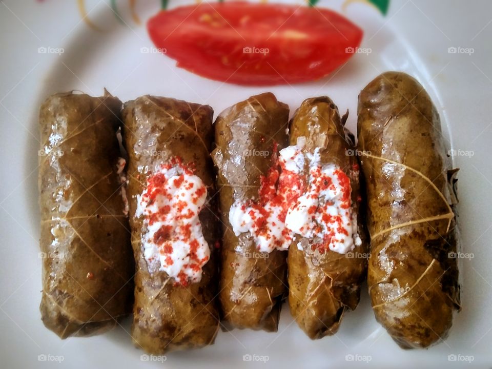 homemade food, grape leaf cabbage rolls.