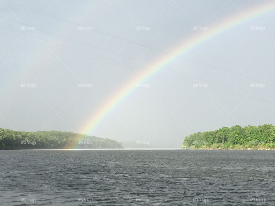 End of the rainbow. Rainbow end in lake 