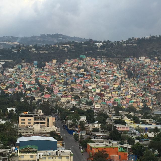 Hills of Haiti. Enjoying a wedding on the roof of a hotel in Haiti I snapped this amazing picture of a home covered hill