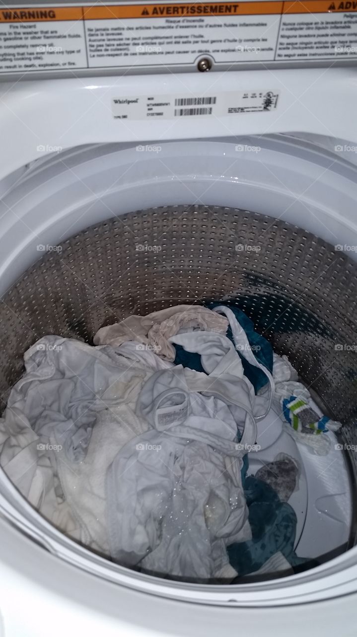 Dirty clothes starting wash cycle