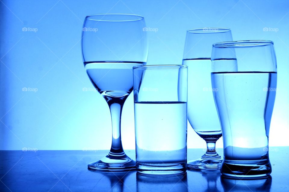 drinking water in different glass and goblets