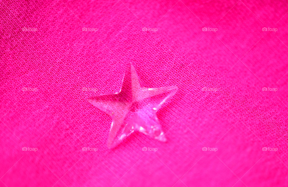 Crystal star on pink background