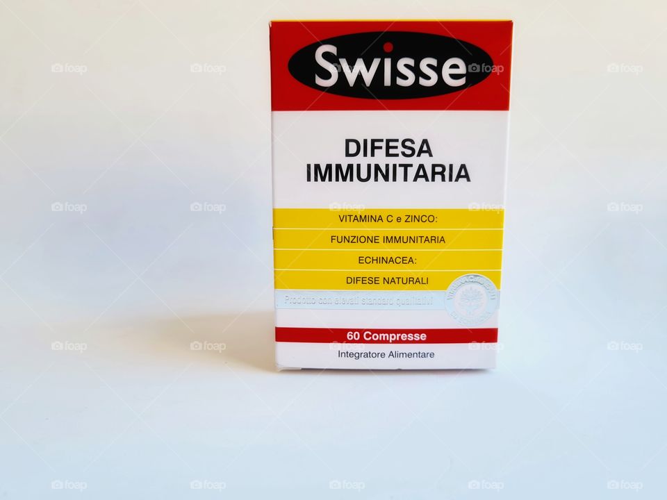 pack of Swisse food supplement on white background