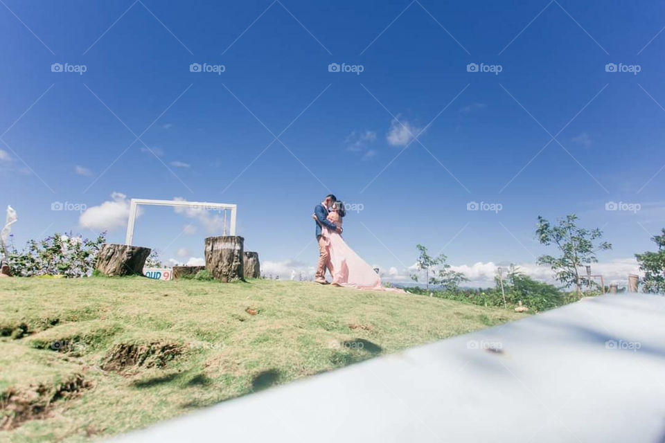 loving couple hugging each other in the rural village