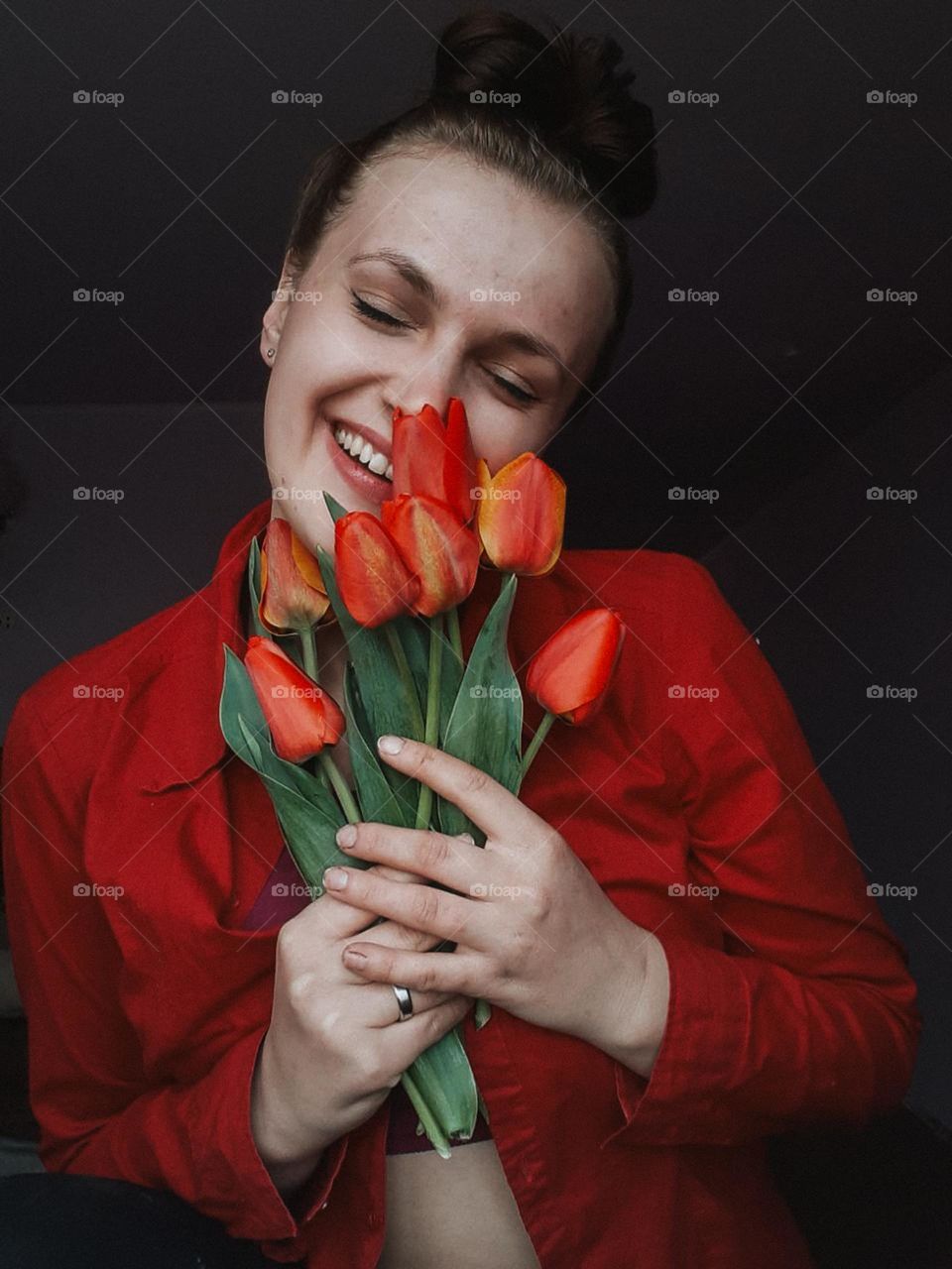 Floral portrait of a girl with tulips